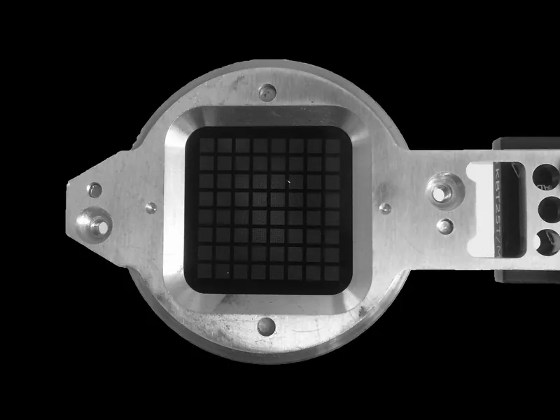 A fixed-target chip used to deliver thousands of crystals to the X-ray beam.